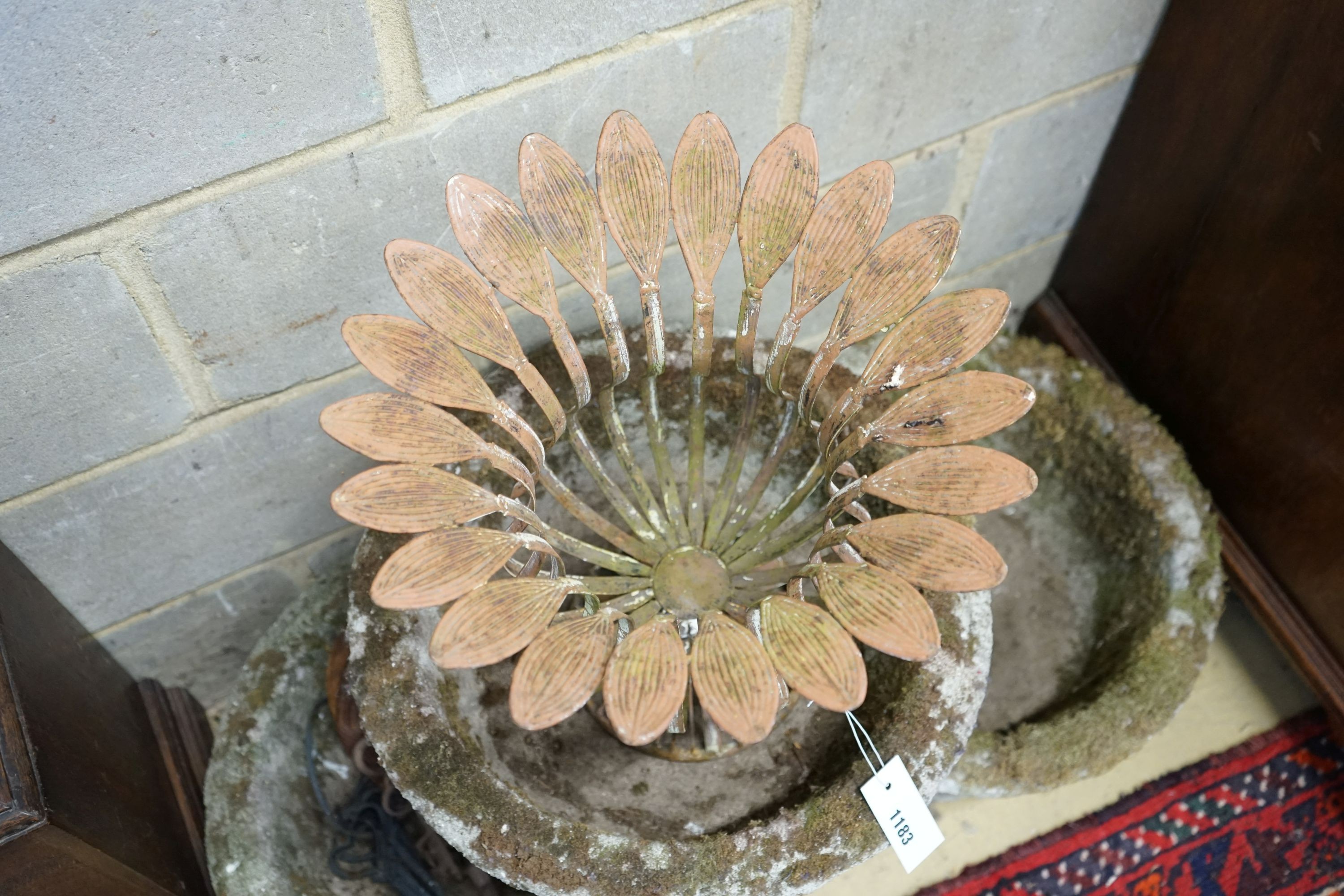 A set of three circular reconstituted stone garden planters, diameter 46cm, together with a metal planter and sundry garden ornaments